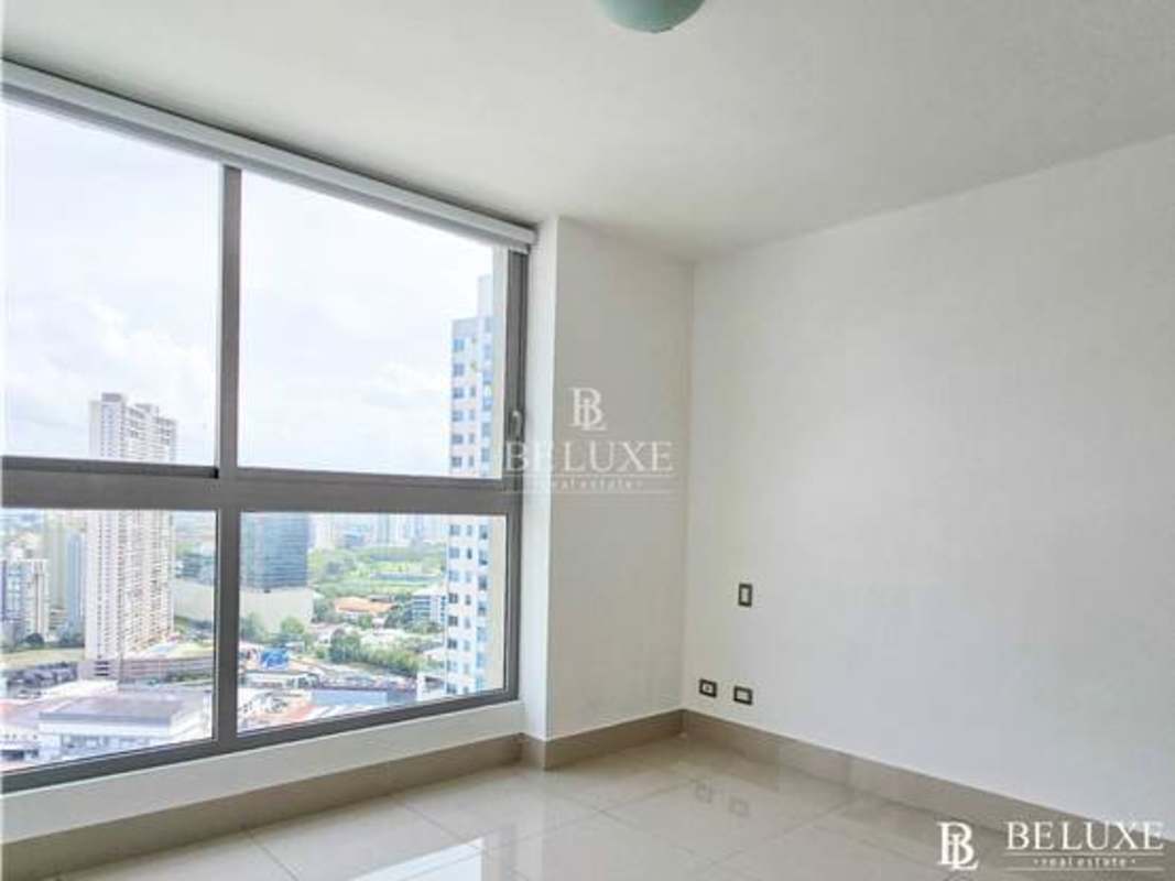 Infinity pool with city skyline views at PH Bali Costa del Este Panama