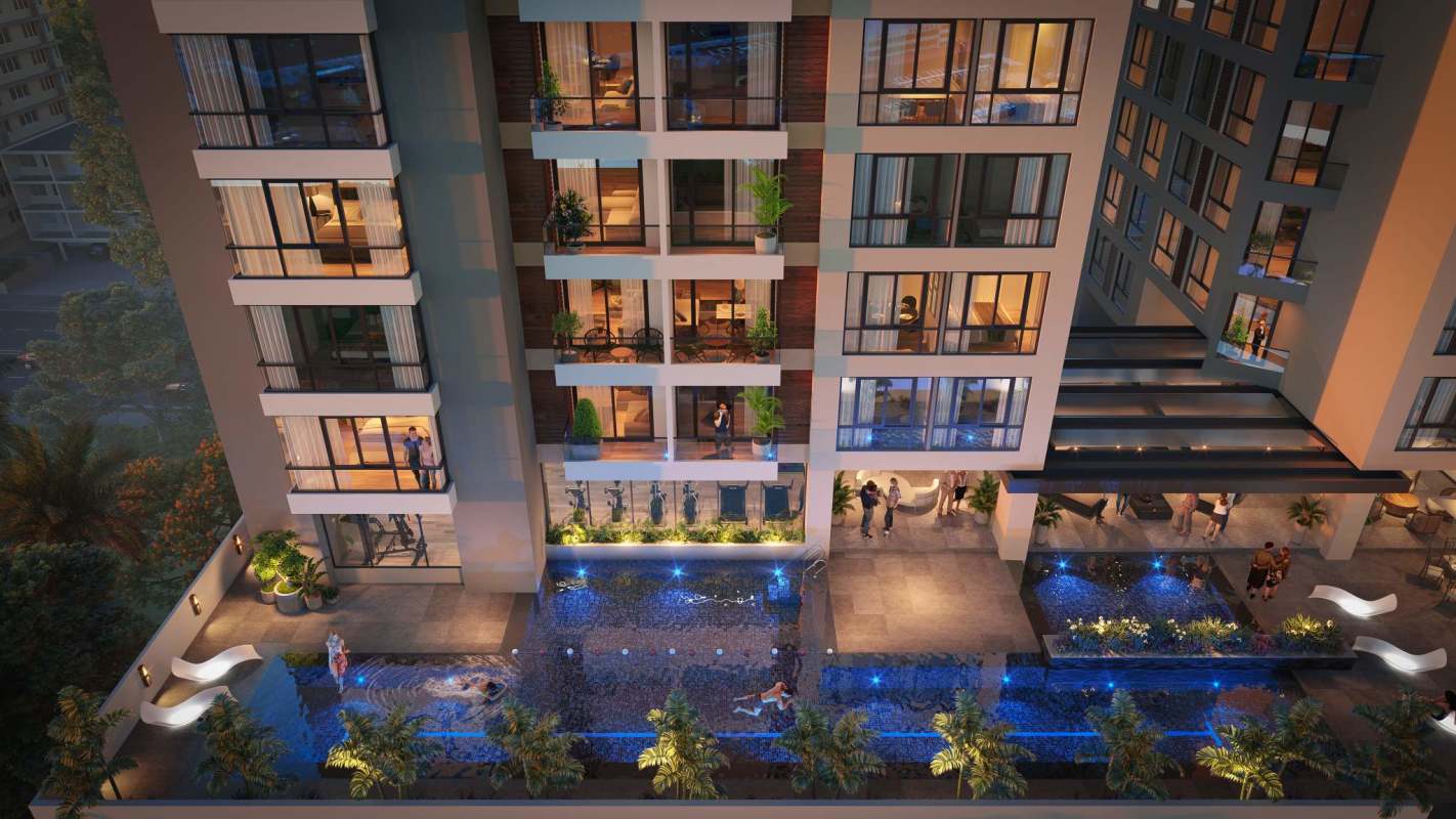 Rooftop infinity pool with city skyline view and lounge area at LOV El Cangrejo Panama