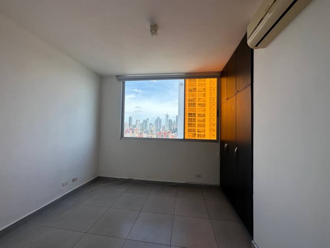 Granite countertop kitchen with stove, fridge, microwave, dishwasher, breakfast bar in PH Element Panama City