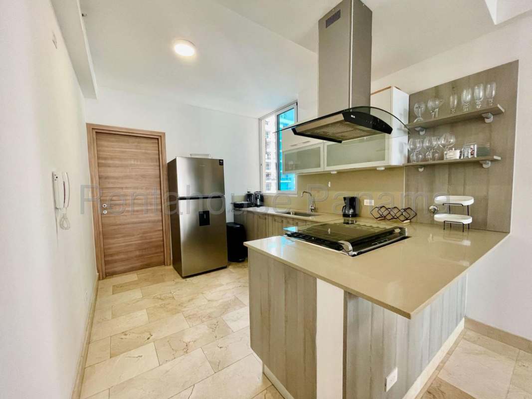 Open plan living dining room marble floor balcony AC Dynasty Residences Panama