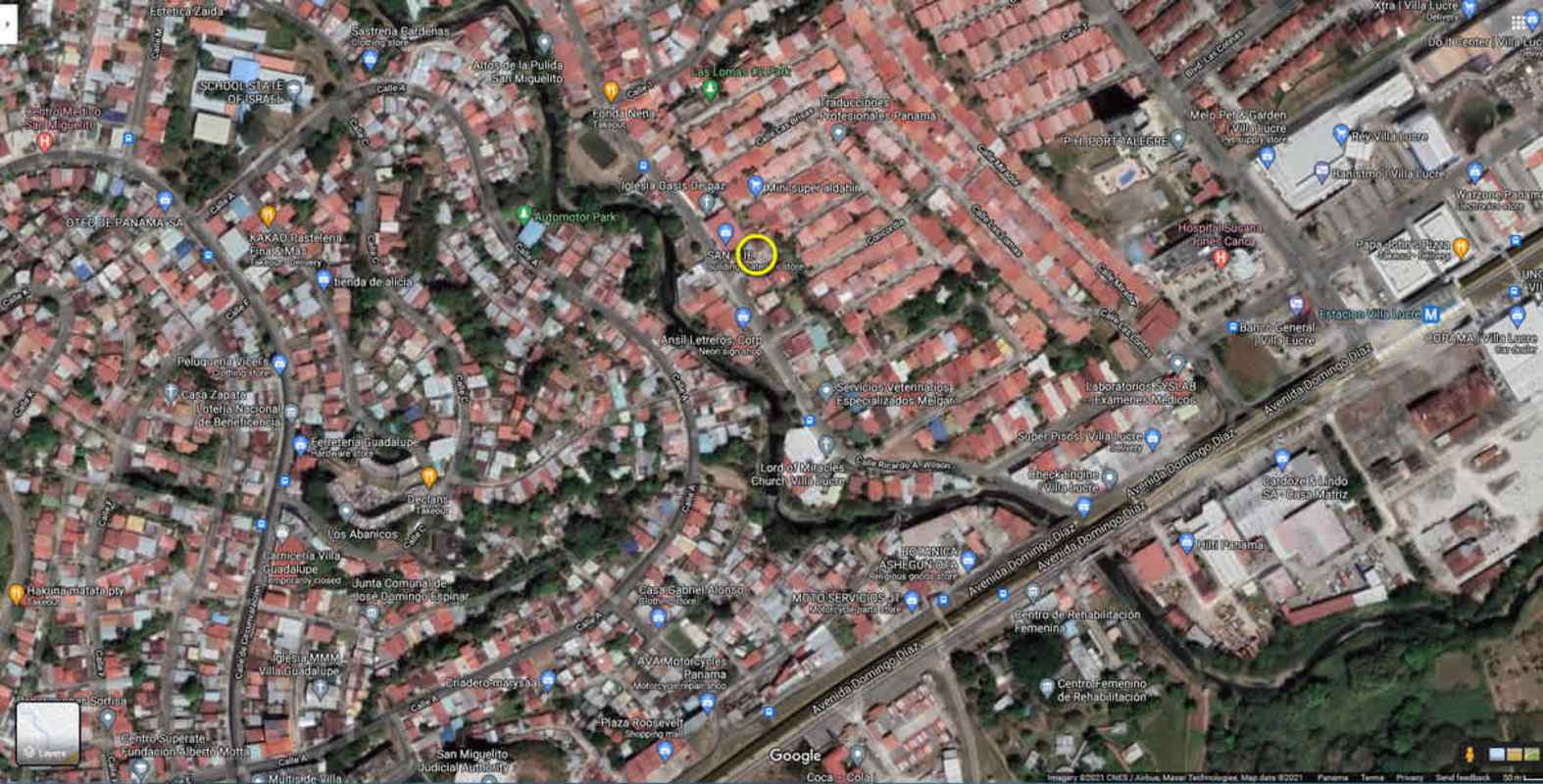 Satellite view dense residential neighborhood near metro station Villa Lucre Panama