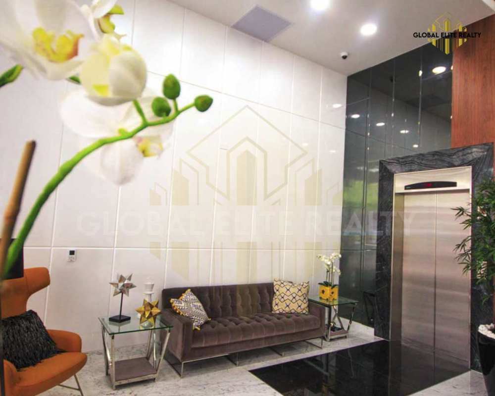 Modern lobby with seating area in PH Vista Hermosa Tower Via España Panama