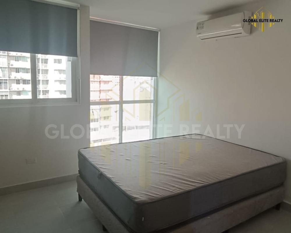 Living-dining room with balcony access and city view in PH Vista Hermosa Via España Panama