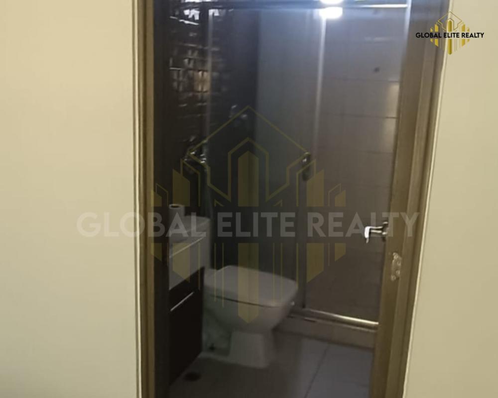 Bathroom with glass-enclosed shower, modern sink and tile PH Vista Hermosa Via España Panama