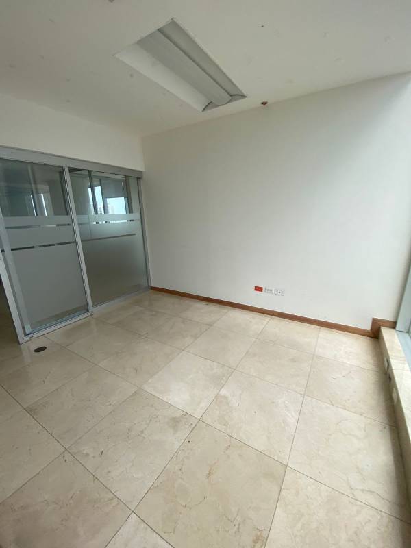Reception counter area with skylight and glass partitions in commercial office Bella Vista Panama