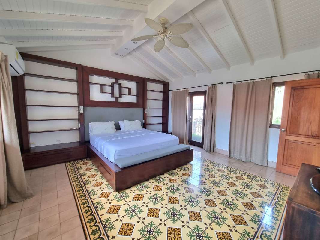 Contemporary kitchen featuring granite countertops and stainless appliances in restored Casco Viejo triplex
