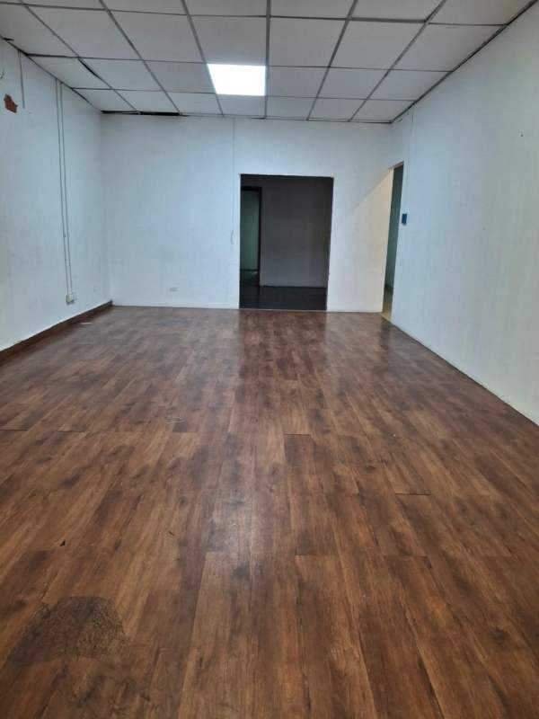 Long corridor exit hallway and internal access at PH Plaza Via España commercial unit Panama
