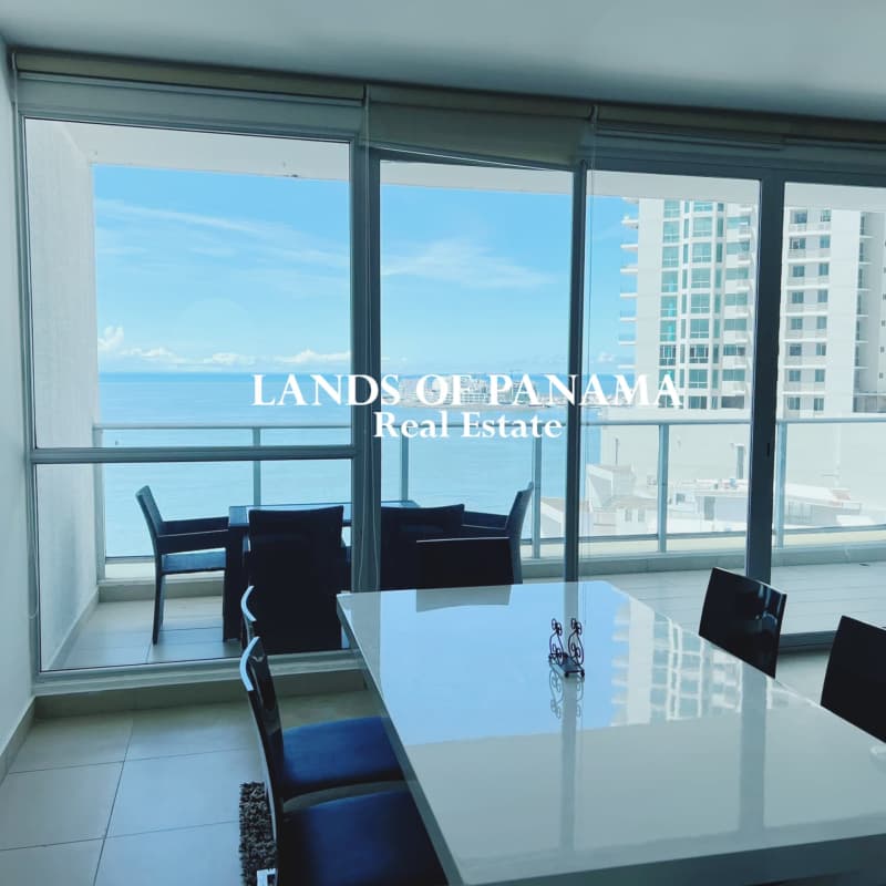 Modern dining room with floor-to-ceiling oceanfront windows PH Oceanaire Punta Pacifica Panama