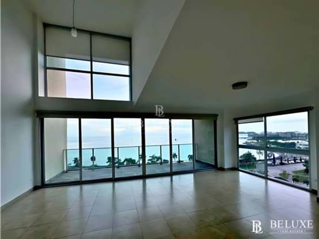 Contemporary kitchen open to loft space with oceanfront views PH H2O Panama