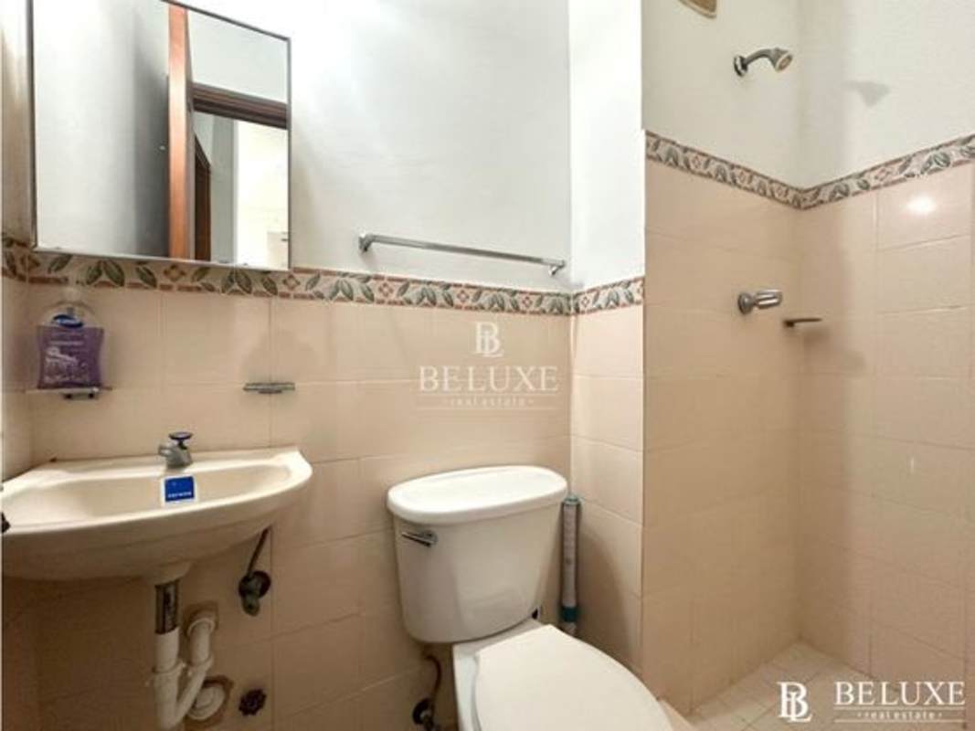 Outdoor swimming pool sun deck lounge at PH San Francisco Bay Panama City San Francisco neighborhood