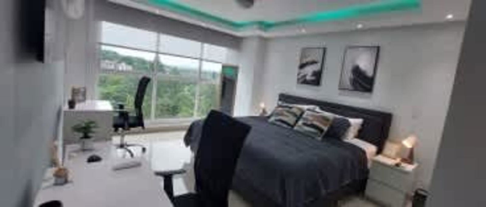 Large bedroom with private bathroom tile floors built-in closet at PH Albrook Point Clayton Panama City