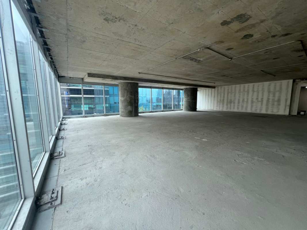 Large unfinished commercial office space with panoramic ocean and city skyline views in Oceanía Business Tower 1000 Panama City