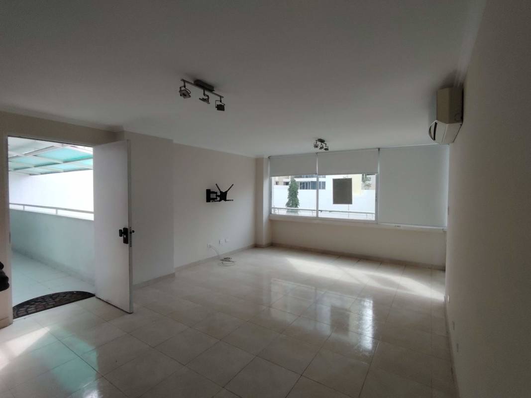 Bright bedroom with large window, AC unit, built-in closet at PH El Mare Plaza Edison Panama City