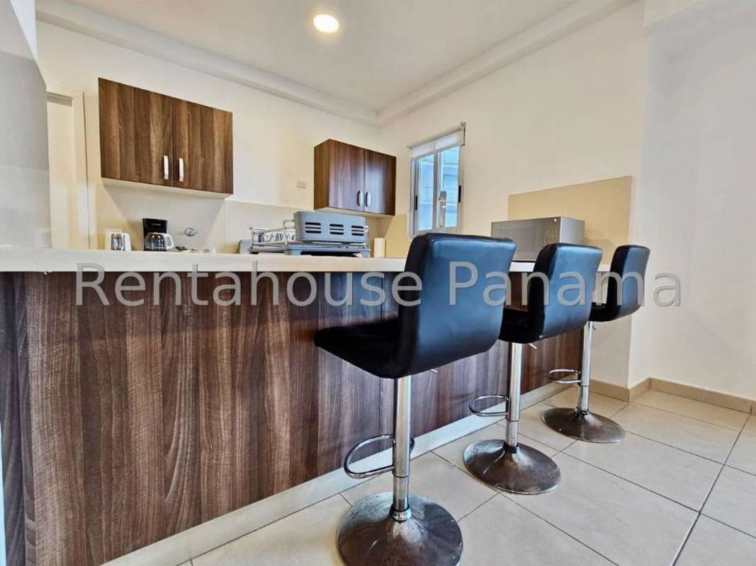 Master bedroom with large windows and ocean views PH Ocean Club Punta Pacifica luxury rental