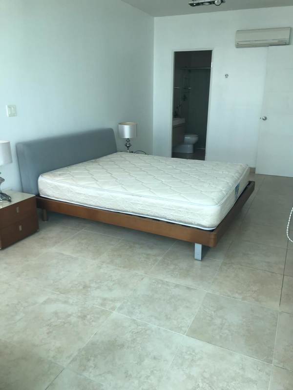 Master bedroom with ocean views in furnished PH H2O apartment Avenida Balboa Panama City