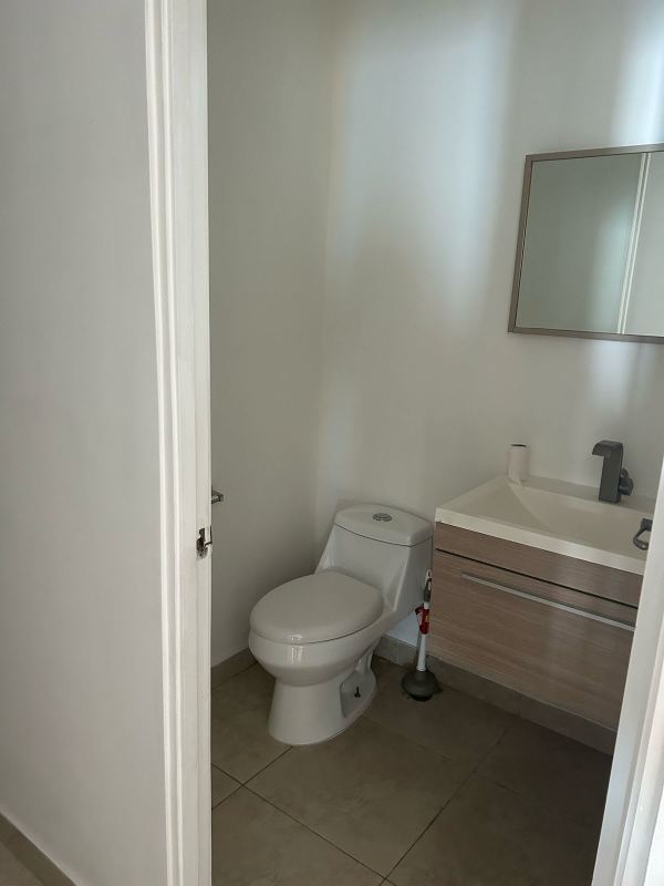 Modern powder room with vanity and mirror in PH H2O Panama