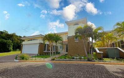 Laundry area with washer dryer inside luxury villa Tucan Country Club Panama Pacifico