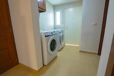 Elegant dining space with vaulted ceiling overlooking pool Tucan Country Club Panama Pacifico
