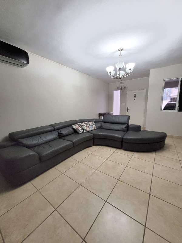 Bathroom with glass shower enclosure, granite countertop, tiled floors Brisas del Golf Panama