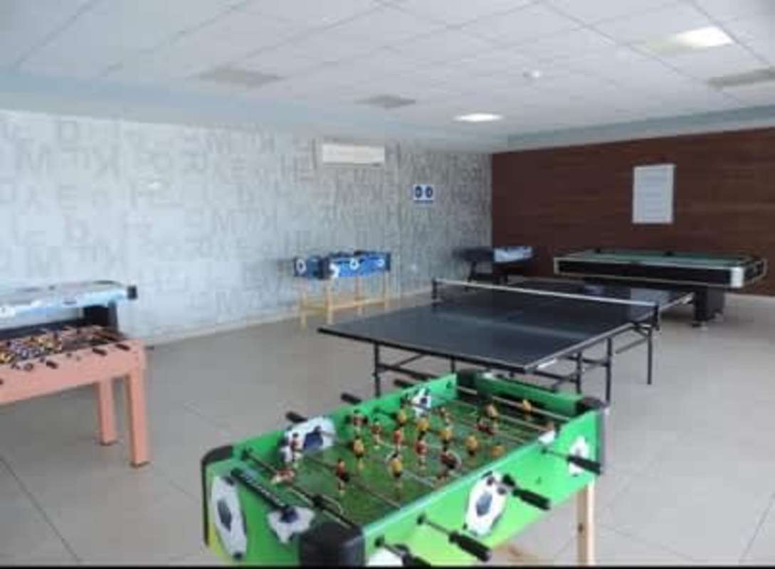 Indoor game room with ping pong, foosball, air hockey, modern decor in Brisas del Golf Panama