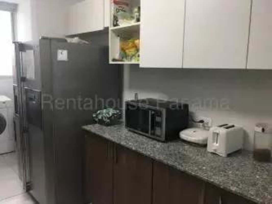 Rooftop swimming pool with lounge chairs at PH Trinity in El Cangrejo Panama City