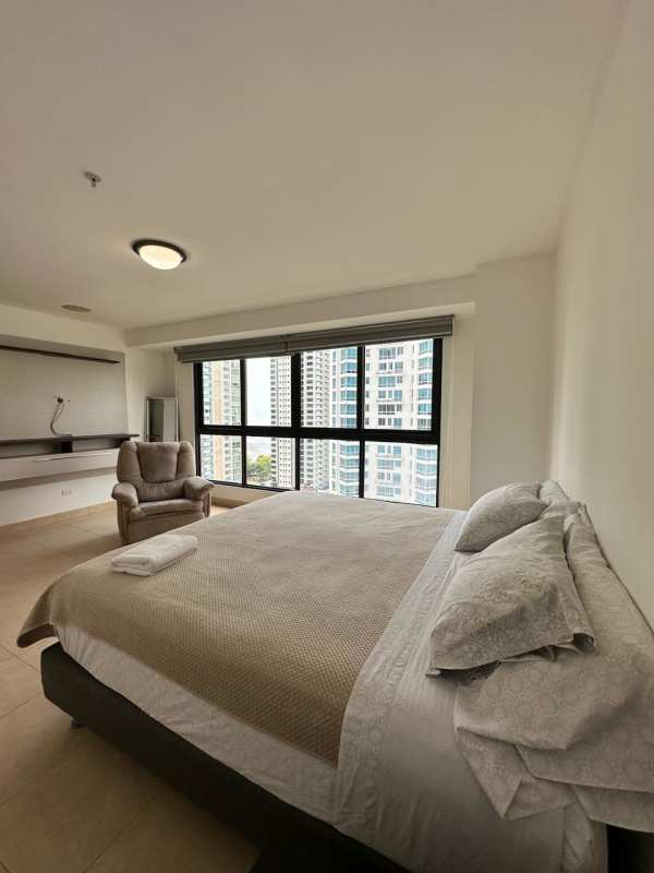 Spacious kitchen with granite countertops, cabinets and appliances in PH Parque del Mar II Panama