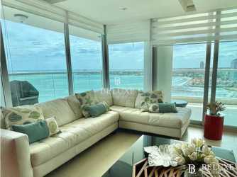 Bright guest bedroom with ocean view windows PH Bahía Playa Serena Panama