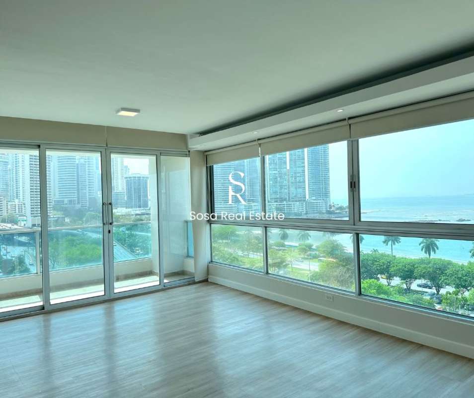 Bedroom with panoramic ocean view and large windows in PH BICSA Tower Panama City