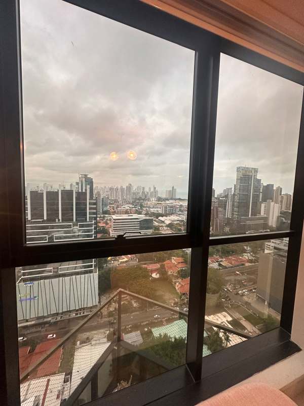 Contemporary gym with treadmills weights large mirrors PH Obarrio Tower Obarrio Panama