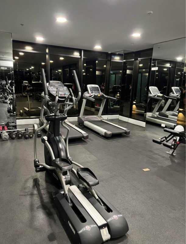 Living room with large windows panoramic city skyline view Obarrio Panama apartment rental