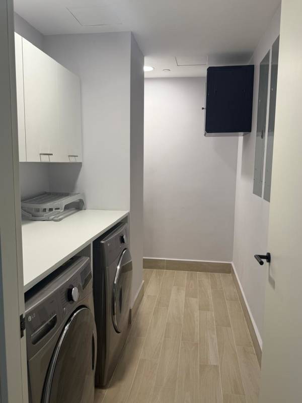 Bright bedroom with city skyline view at Ocean Reef Islands Punta Pacifica Panama