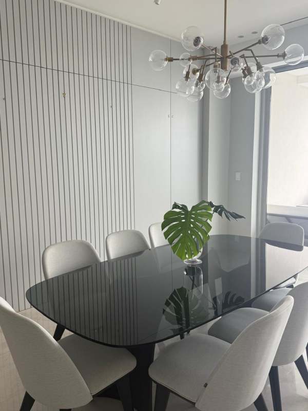 Contemporary kitchen with built-in appliances and elegant finishes Ocean Reef Islands