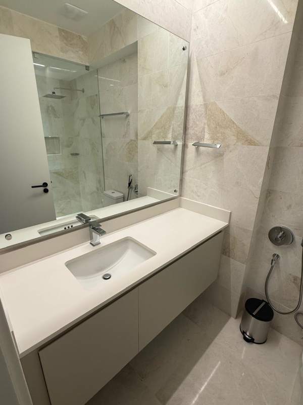 Dual sink bathroom with modern fixtures and glass shower Ocean Reef Islands Panama
