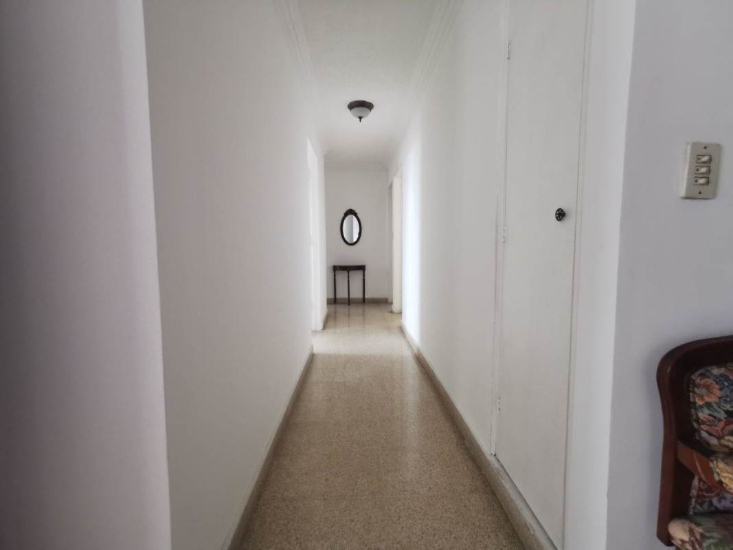 Contemporary kitchen blue marble counertops wood cabinets PH Fuente de los Cibeles Villa de las Fuentes Panama