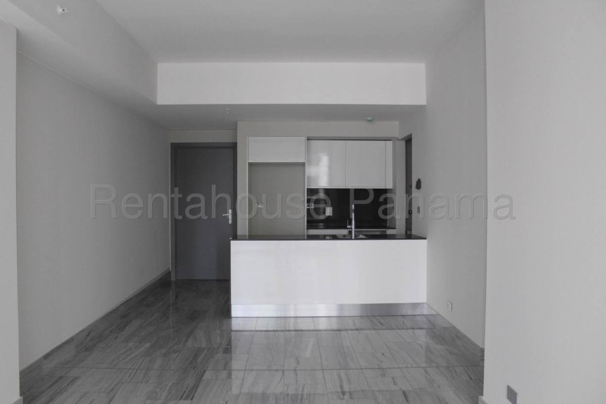 Luxurious master bedroom with floor-to-ceiling windows and city skyline views Nuovo by Armani Casa