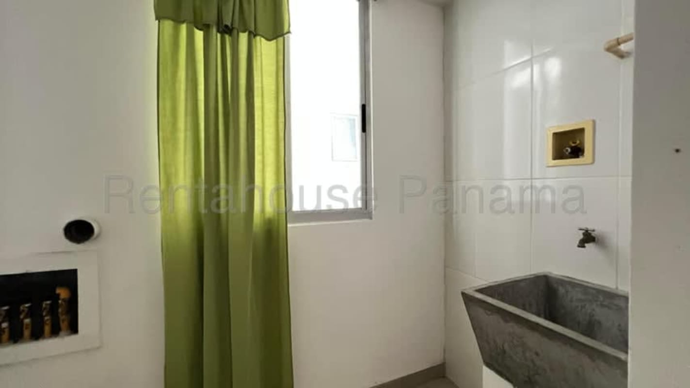 Modern kitchen with granite top and white cabinets PH Altamira Hato Pintado Panama