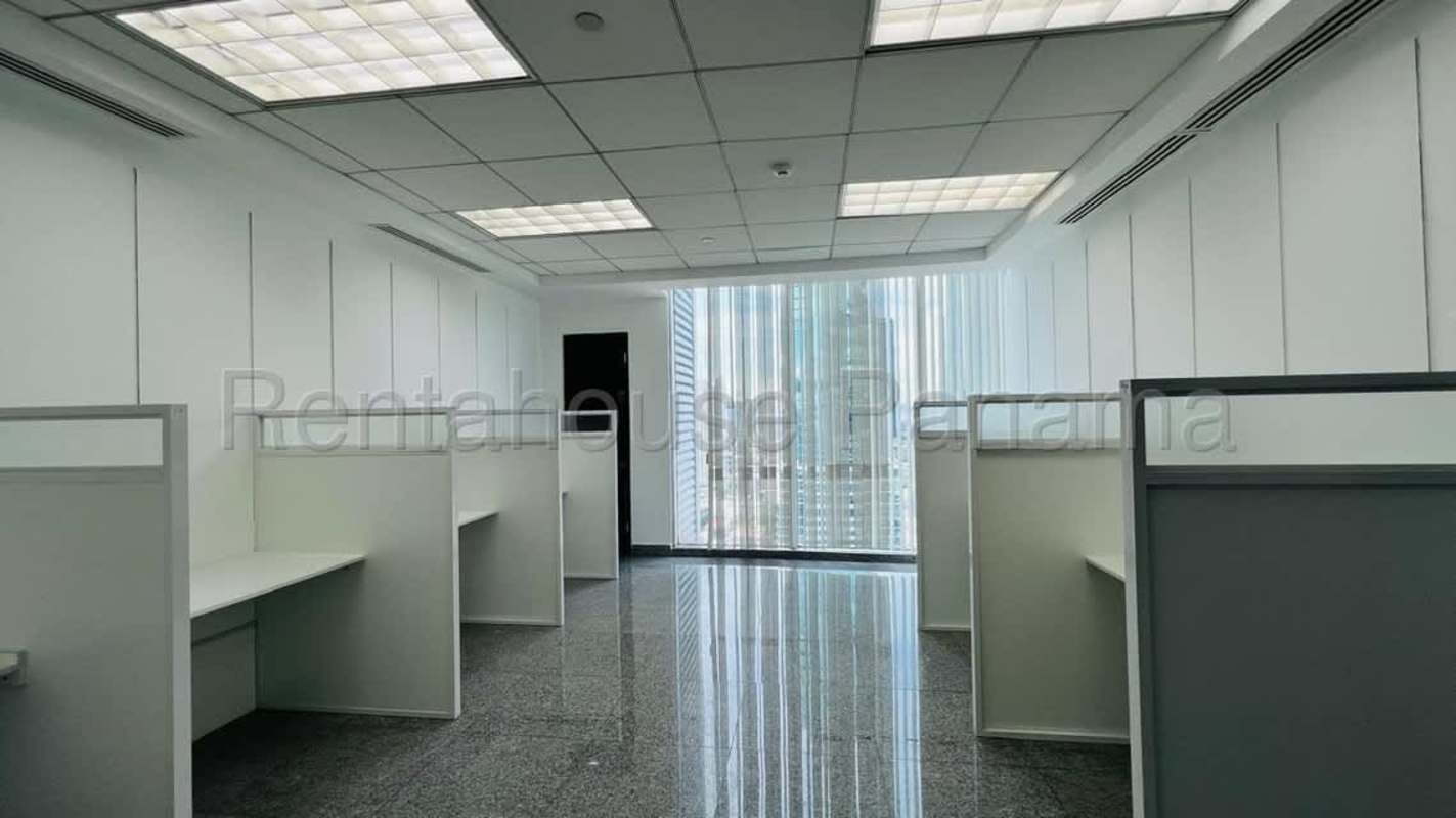 Large open office area with city views through windows PH CCD Business Center Panama