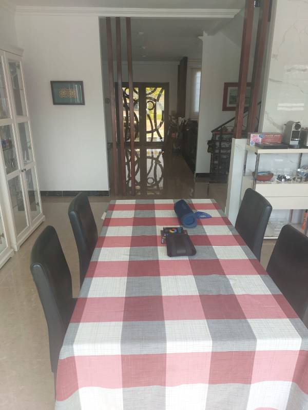 Spacious dining room with checkered table modern decor Club de Golf Panama