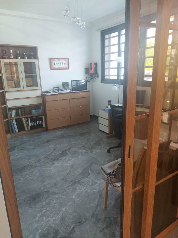 Dedicated study area with marble floors wood accents golf community Panama