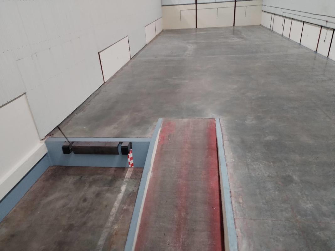 Loading bay area inside warehouse with high roof and wide entry in Don Bosco Panama City