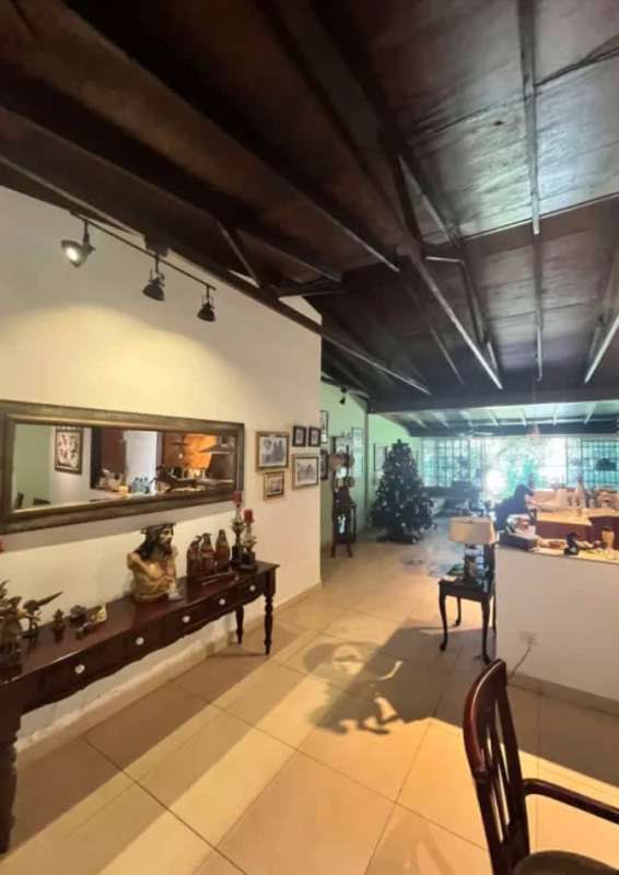 Kitchen with island, wood cabinetry in house rental Llanos de Curundu Panama