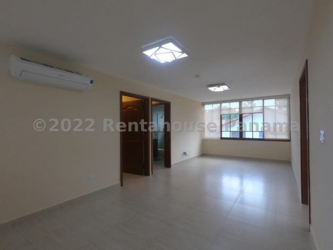 Modern living room with sliding doors to terrace Senderos Camino de Cruces Clayton Panama