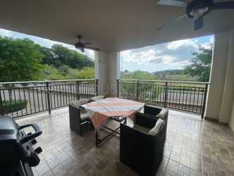 Bedroom with air conditioning and large window at furnished rental in Panama Pacifico