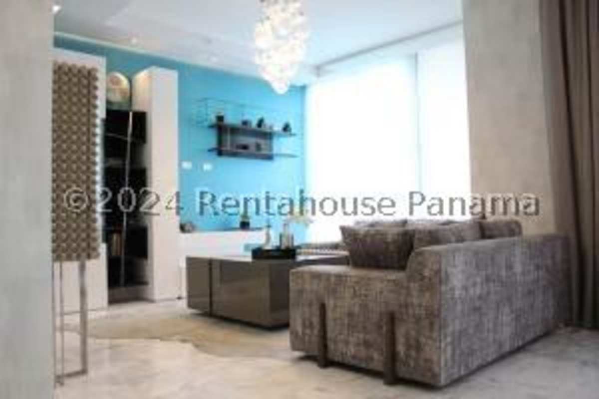 Expansive private balcony with glass railing panoramic ocean skyline view at PH Regalia Costa del Este