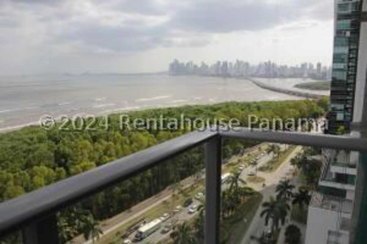 Luxury open kitchen with marble counters, island, stainless steel appliances in PH Regalia Costa del Este