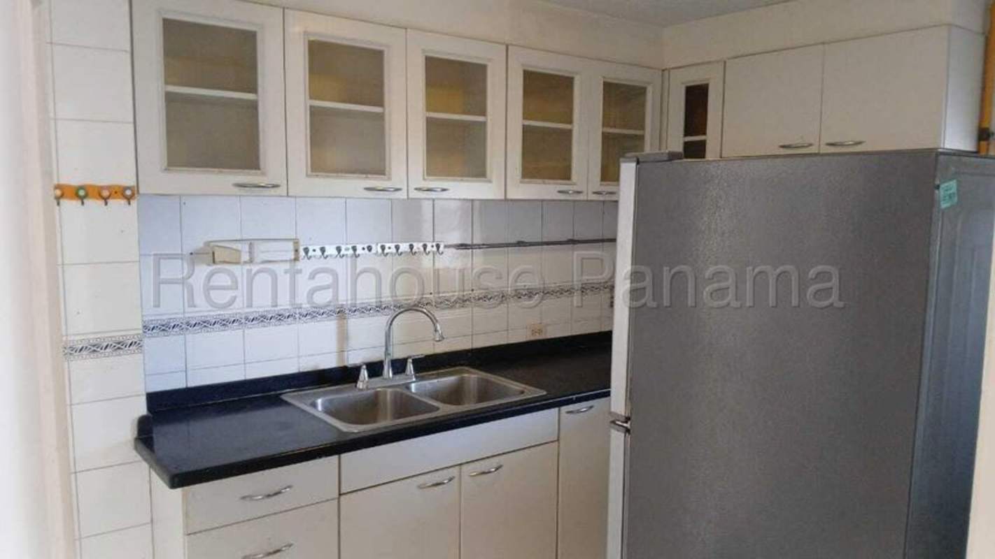 Apartment kitchen with modern cabinetry, fridge and stove PH El Cangrejo Panama