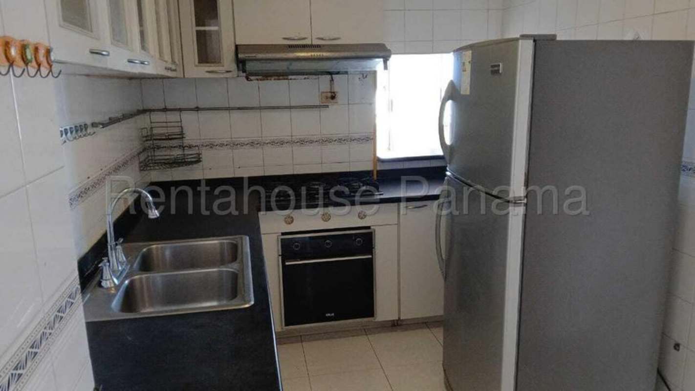 Covered social lounge with bar and seating area PH El Cangrejo Panama