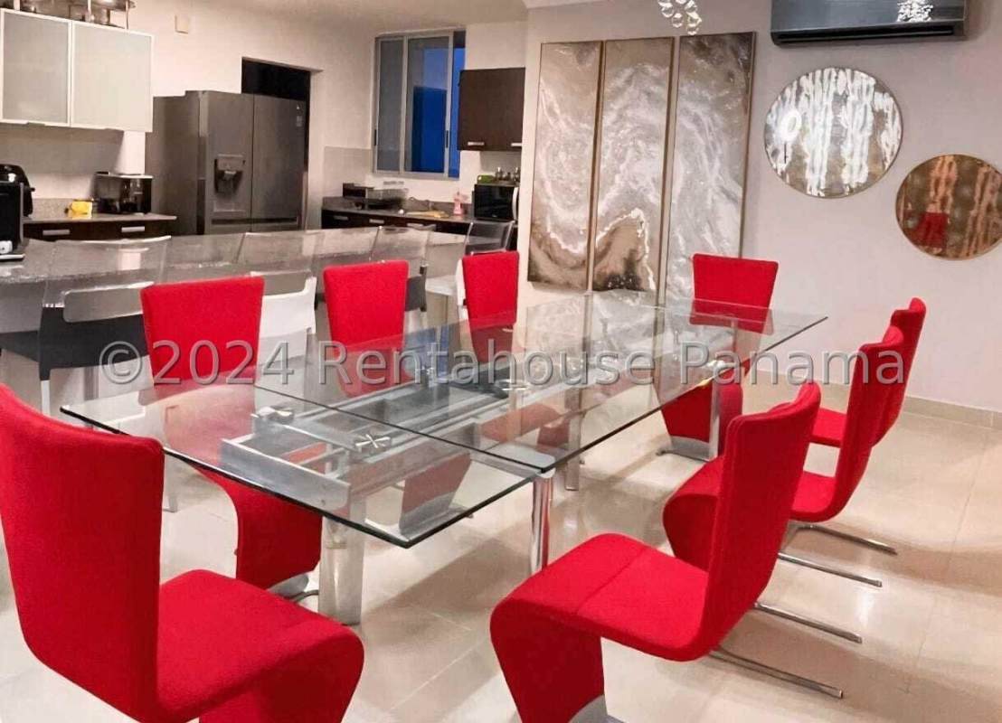 Spacious bedroom with built-in closet and ensuite bath at PH Waterfalls Panama City