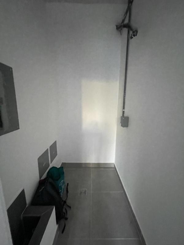 Commercial space with exposed piping, tiled floor, glass entry in Casco Viejo Panama