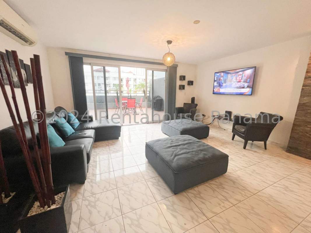 Bright open concept living room with access to terrace at PH Parque Lindo II Parque Lefevre